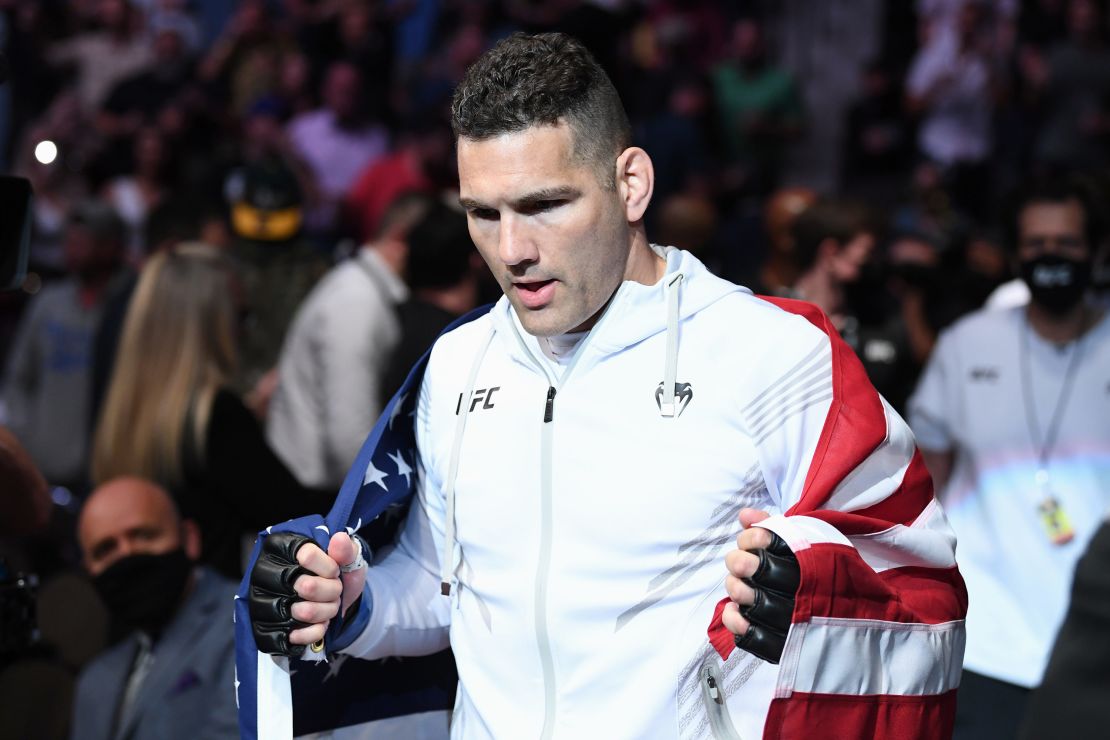 Weidman walks out towards the Octagon prior to facing Hall.