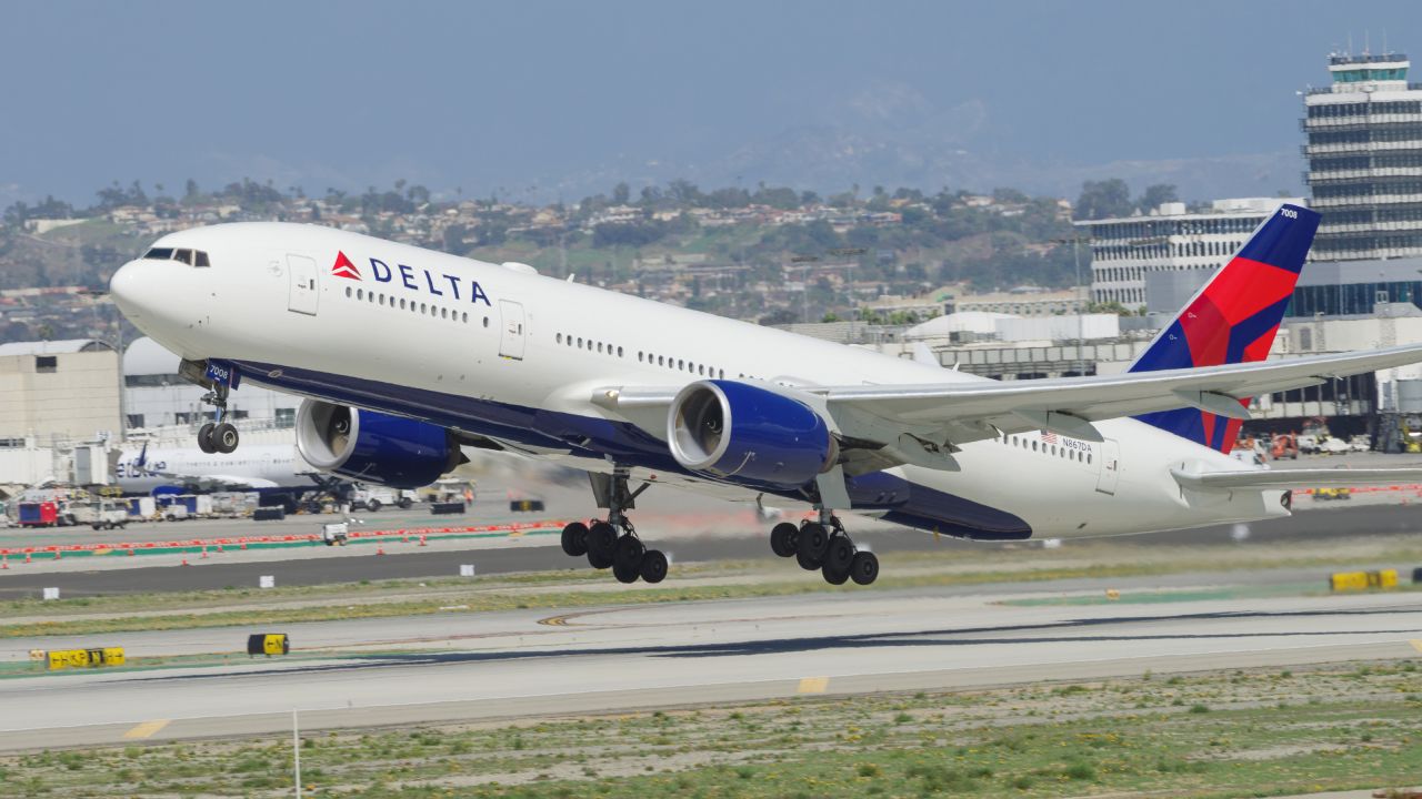 underscored delta 777 airplane takeoff from los angeles lax