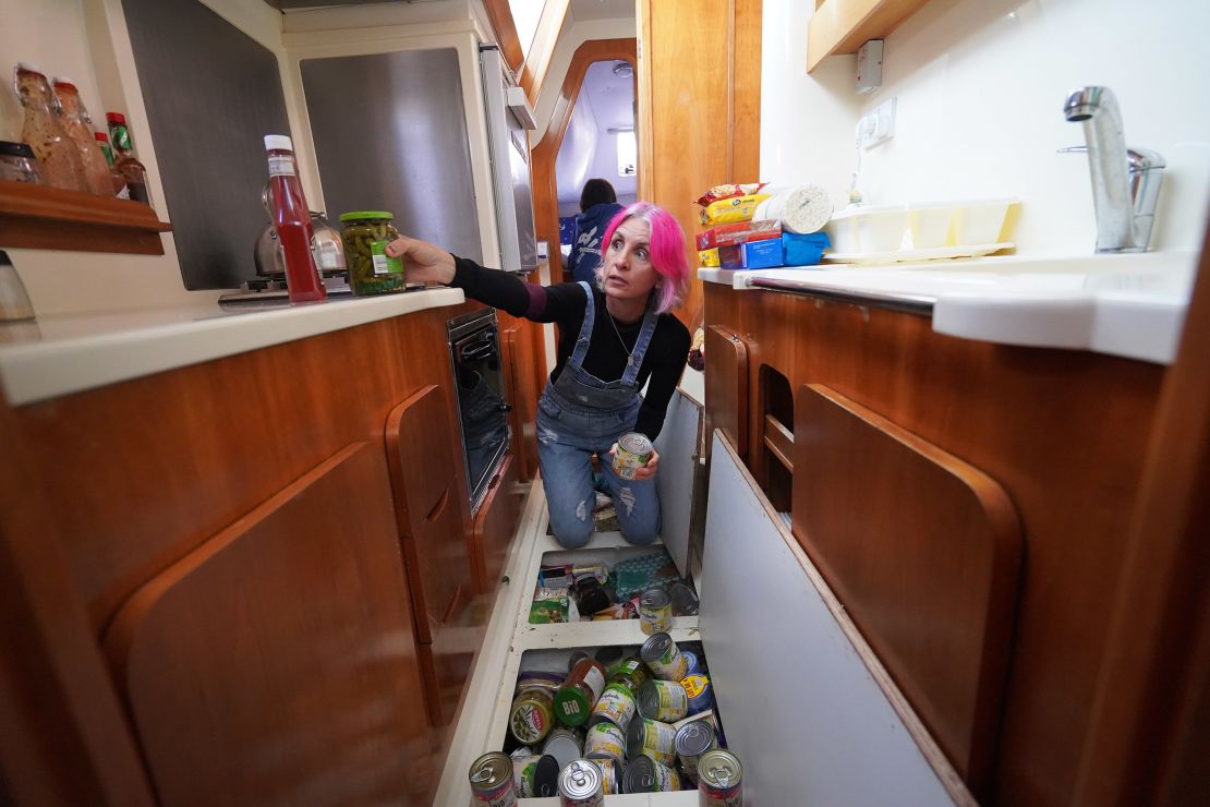 Storage is tight for the family of four. Overflow groceries go in lockers under the floors.