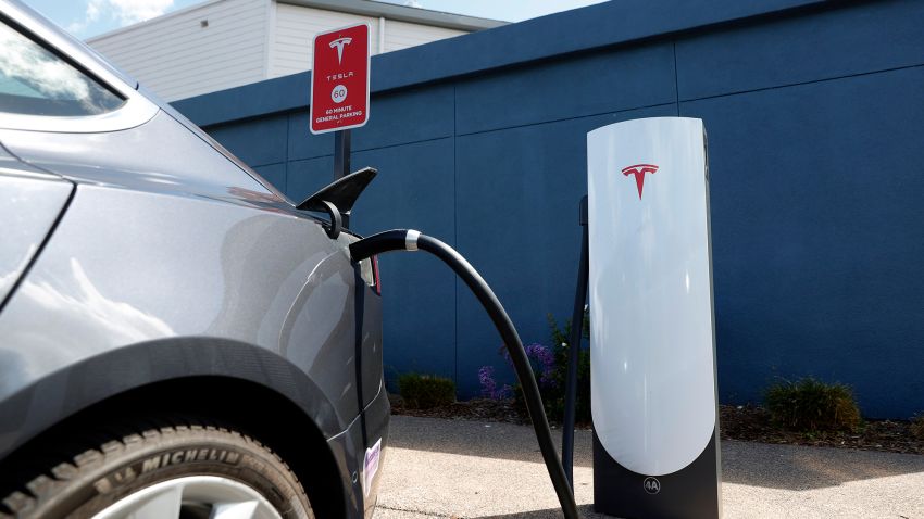 A Tesla car charges at a Tesla Supercharger station on April 26, 2021 in Corte Madera, California. Tesla will report first quarter earnings today after the closing bell. (Photo by Justin Sullivan/Getty Images)