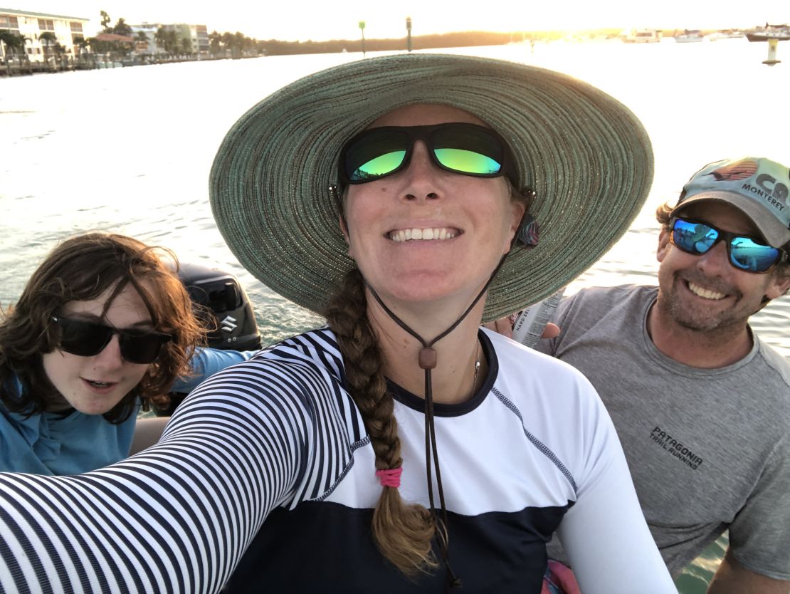 Cody, Randi and Steve  Hitchcock (from left to right) have been living aboard their catamaran.