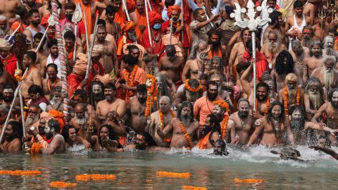 Naked Hindu holy men take dips in the Ganges River during Kumbh Mela, one of the most sacred pilgrimages in Hinduism, in Haridwar, northern state of Uttarakhand, India, on April 12, 2021. 