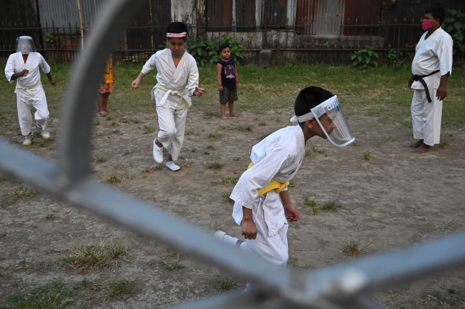 Children wear face shields at a martial-arts class in Kolkata on April 5.