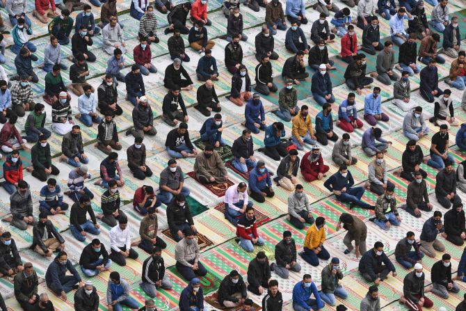 People gather at a Srinagar mosque on the first day of <a href="index.php?page=&url=http%3A%2F%2Fwww.cnn.com%2F2021%2F04%2F13%2Fworld%2Fgallery%2Framadan-2021%2Findex.html" target="_blank">Ramadan</a> on April 14.