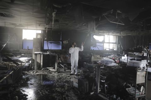 A man inspects an intensive-care ward after a fire broke out at a Covid-19 hospital in Virar on April 23. At least 13 Covid-19 patients were killed in the fire.