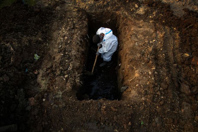 A worker digs a grave for a Covid-19 victim in Guwahati on April 25. 