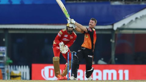 Warner plays a shot during the match against Punjab Kings.