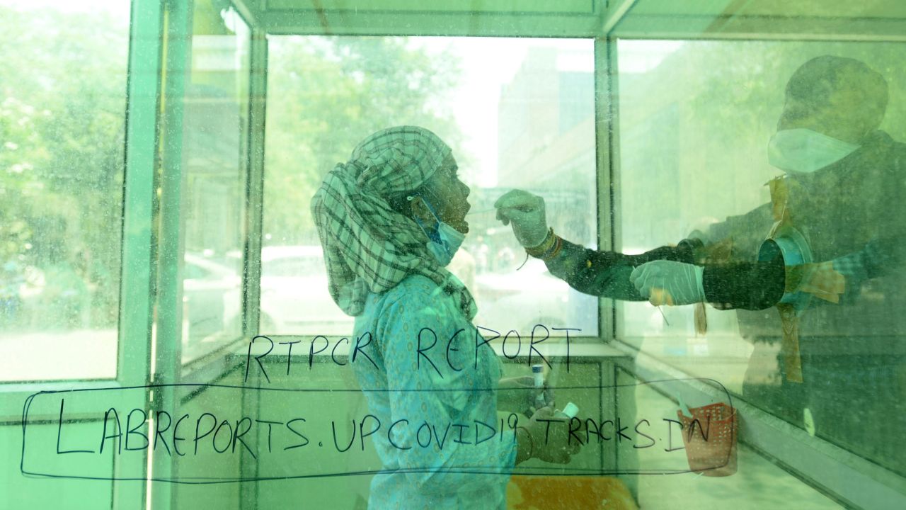 A health worker administers a Covid-19 test at a hospital in Noida on April 26.