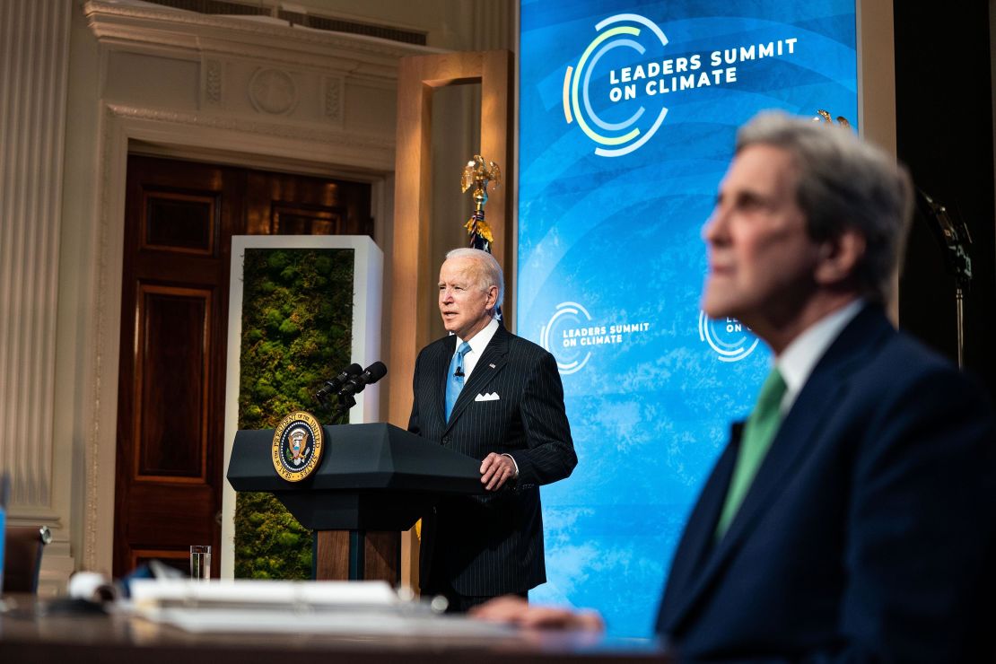 President Joe Biden, left, delivering remarks alongside Special Presidential Envoy for Climate John Kerry on the second day of the virtual climate summit on April 23. 