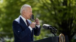 U.S. President Joe Biden removes his mask before speaking about updated CDC mask guidance on the North Lawn of the White House on April 27, 2021 in Washington, DC. President Biden announced updated CDC guidance, saying vaccinated Americans do not need to wear a mask outside when in small groups.  