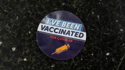 A sticker that reads Ive been vaccinated for Covid-19 is seen on the floor in a hallway at Thomas Jefferson University Hospital in Philadelphia, Pennsylvania on December 16, 2020. - Today was the first day Pfizers Covid-19 vaccine was administered for the staff of Jefferson Health in Philadelphia. The vaccine is voluntary and is available to staff via invitation, with those who have the most exposure to Covid-19 patients given first priority for inoculation. (Photo by GABRIELLA AUDI / AFP) (Photo by GABRIELLA AUDI/AFP via Getty Images)