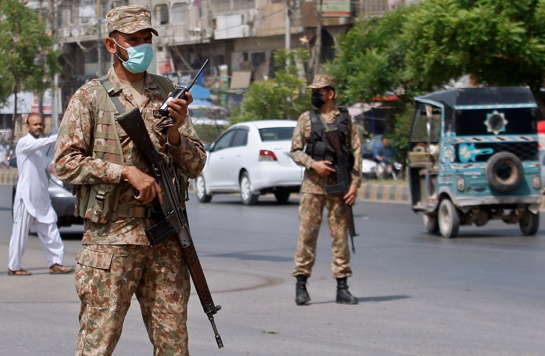 Army troops help enforce new Covid-19 restrictions in Karachi, Pakistan, on April 27.