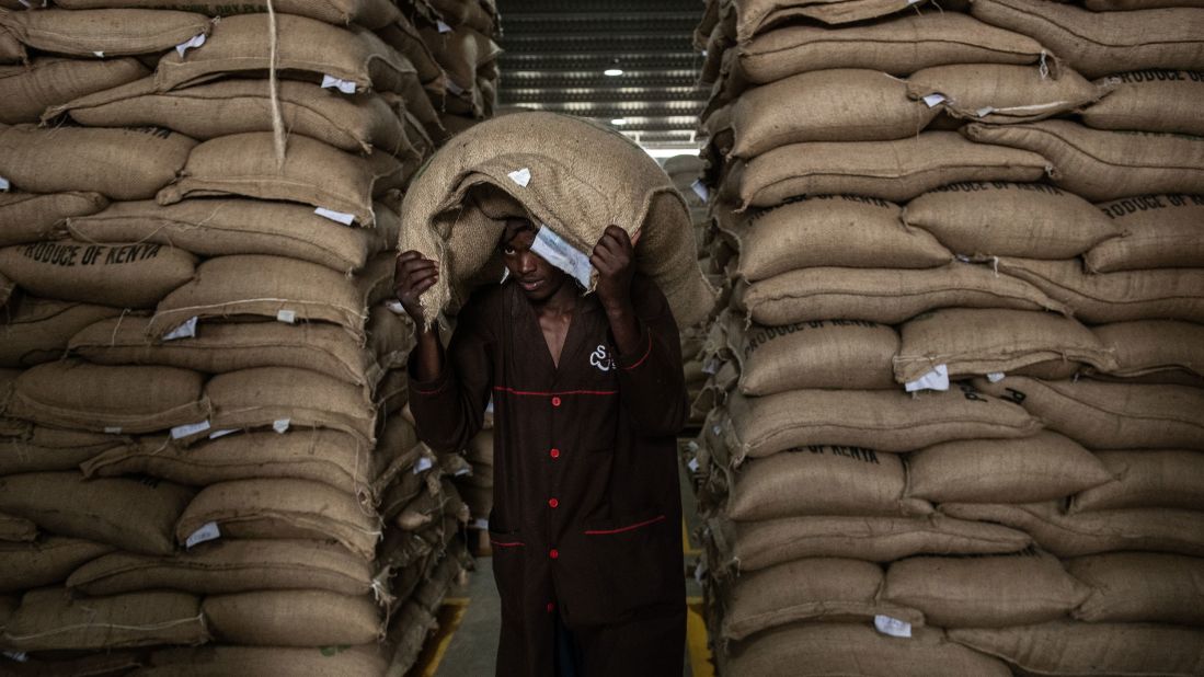 <strong>Kenya</strong> -- Though Kenya has a large domestic tea market, the country's homegrown coffee consumption is on the rise. Here, a worker in the warehouse of Dormans Coffee -- Kenya's first coffee roaster, dating back to <a href="https://www.cdormancoffee.com/about-us" target="_blank" target="_blank">1950</a> -- moves green coffee in the warehouse.