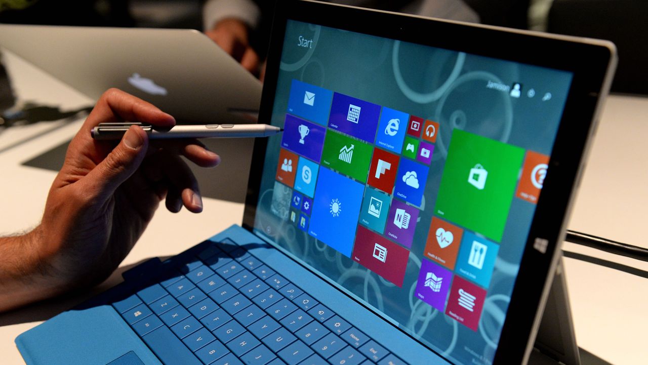 The new Microsoft Surface Pro 3 tablet with detachable keyboard and pen for writing on the screen after it was unveiled May 19, 2014 in New York. Microsoft unveiled the Surface Pro 3 tablet at an event in New York on Tuesday, as it attempts to fuel interest in its struggling tablet line amid increasing competition. The Intel Core-powered tablet measures 0.36 inches thick, boasts a 12-inch screen and weighs just under 2 pounds.