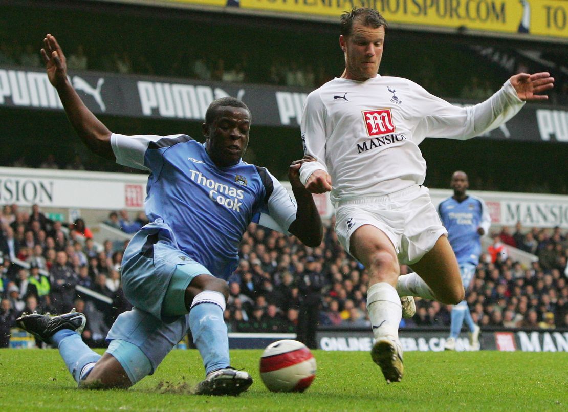 Onuoha battles for the ball in a game between Manchester City and Tottenham.