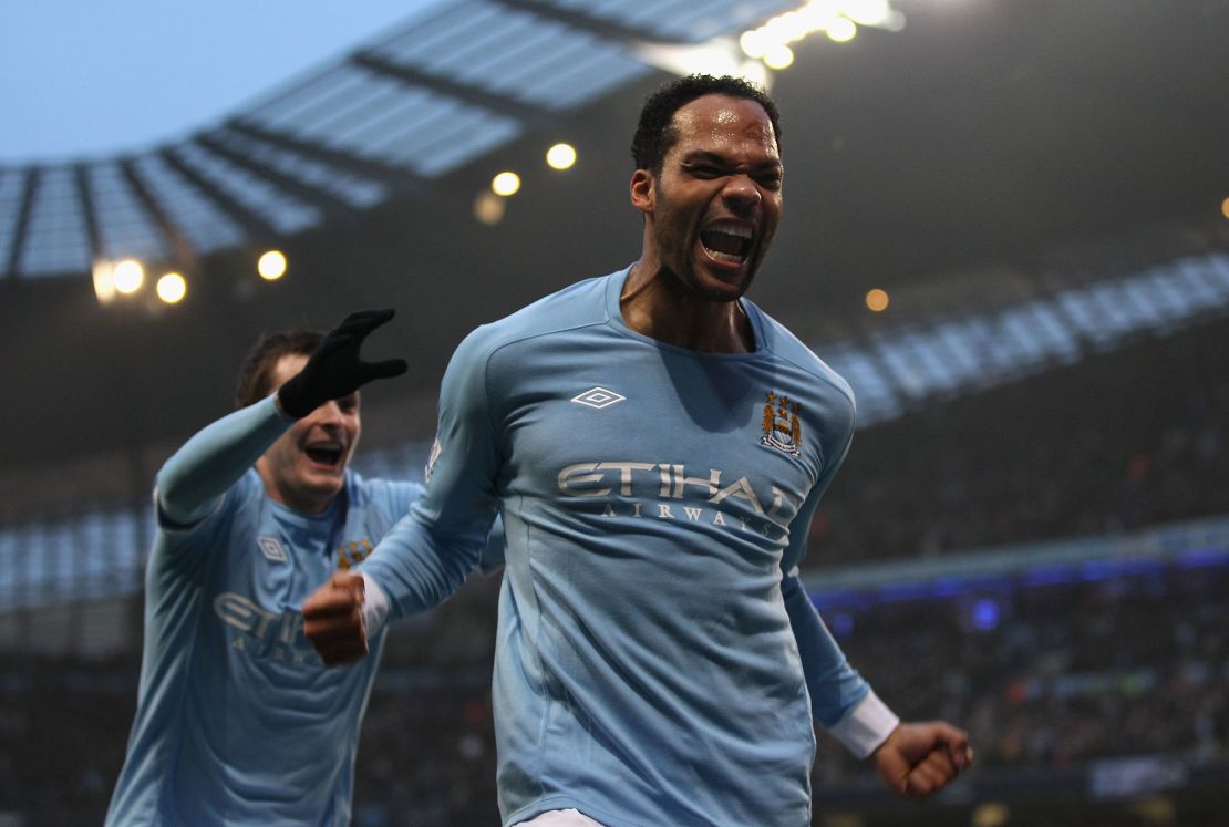 Lescott celebrates after scoring the second goal during the Premier League match against Aston Villa. 