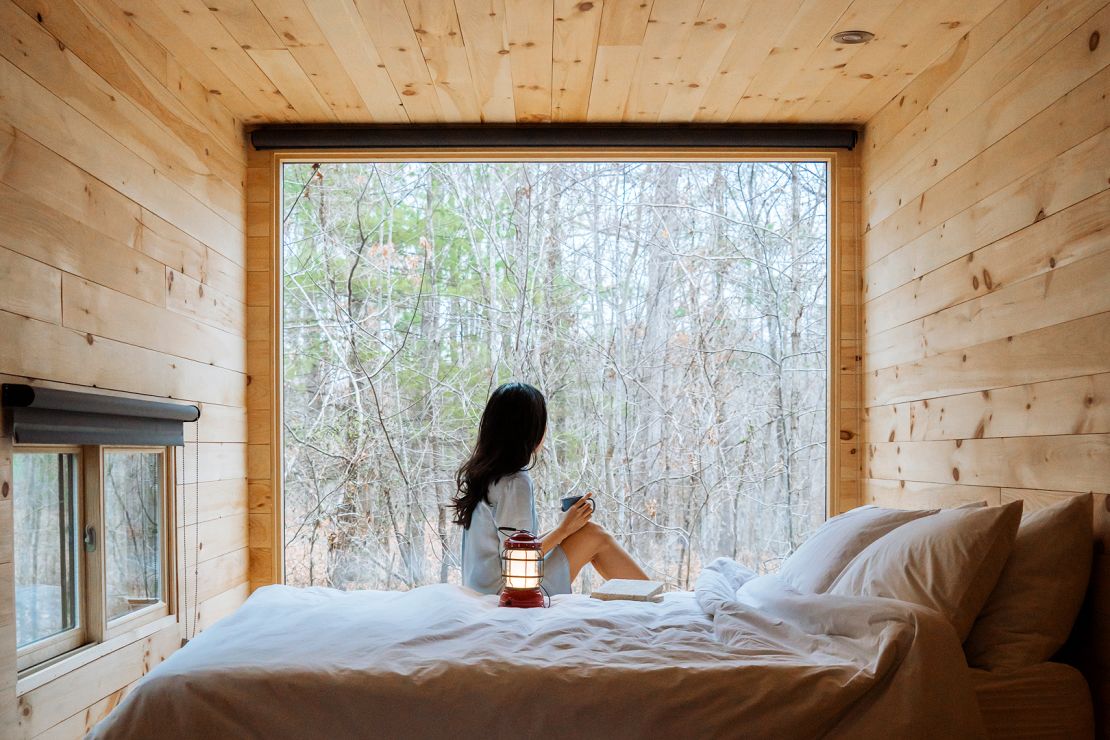 A window onto the woods is each Getaway cabin's defining feature. Some cabins have queen bunks.