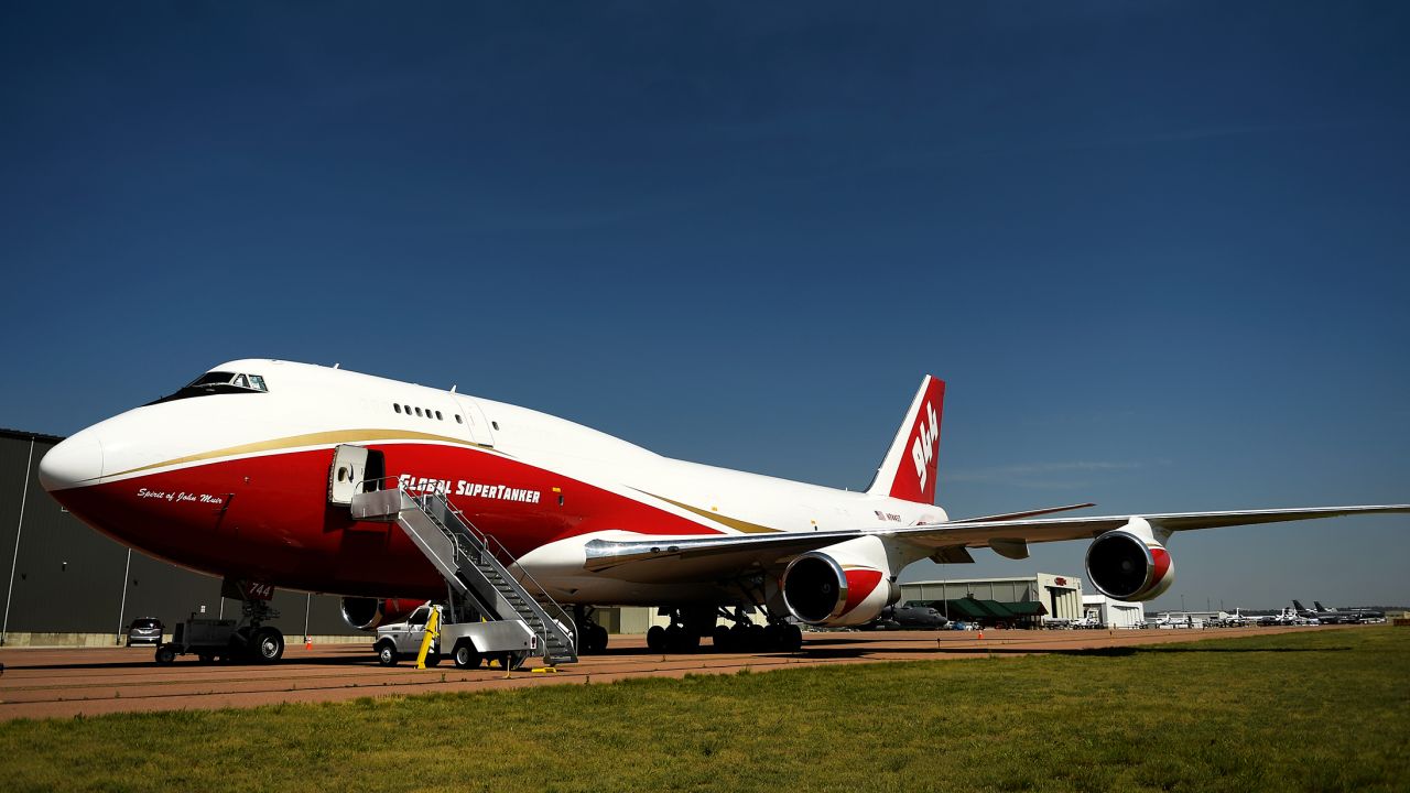 The world's largest firefighting plane sits on the tarmac.