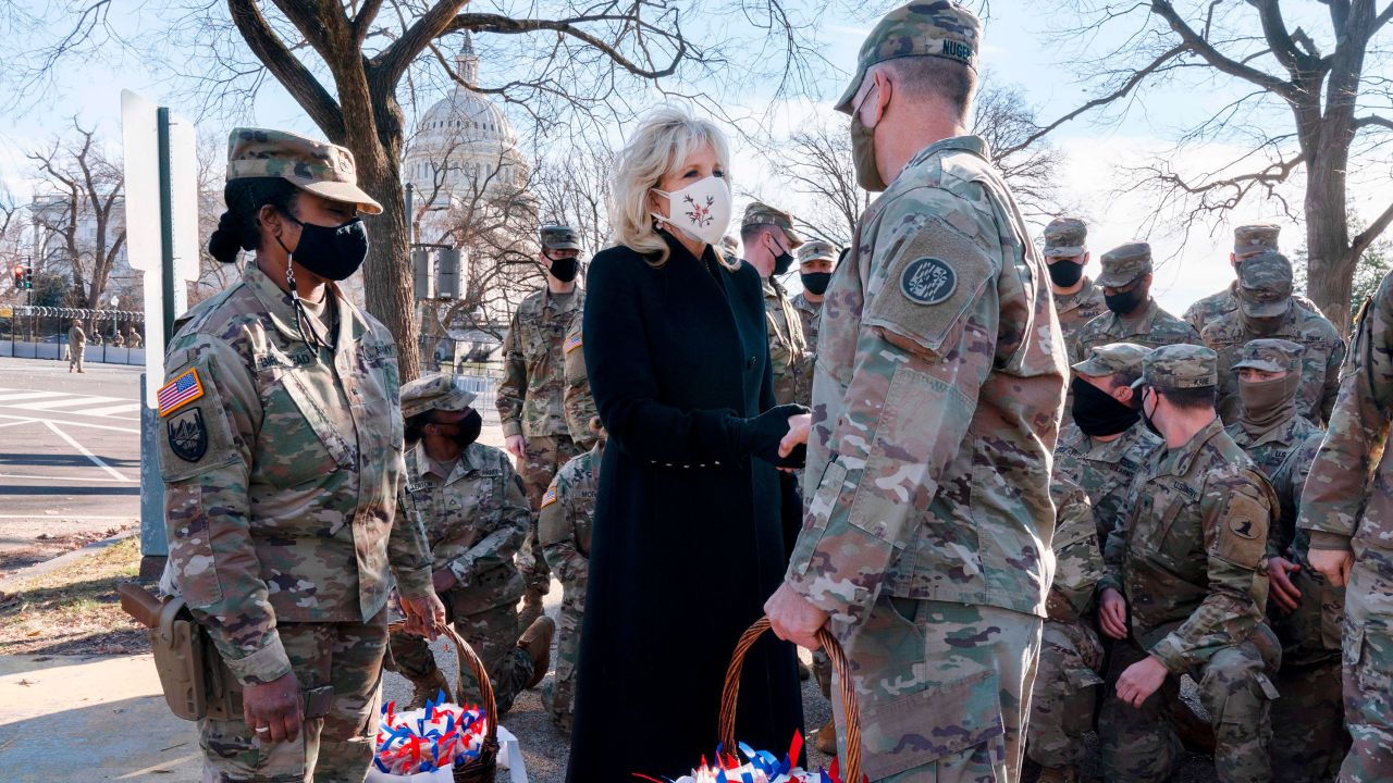 Biden greets members of the National Guard with chocolate chip cookies outside the US Capitol in January. 