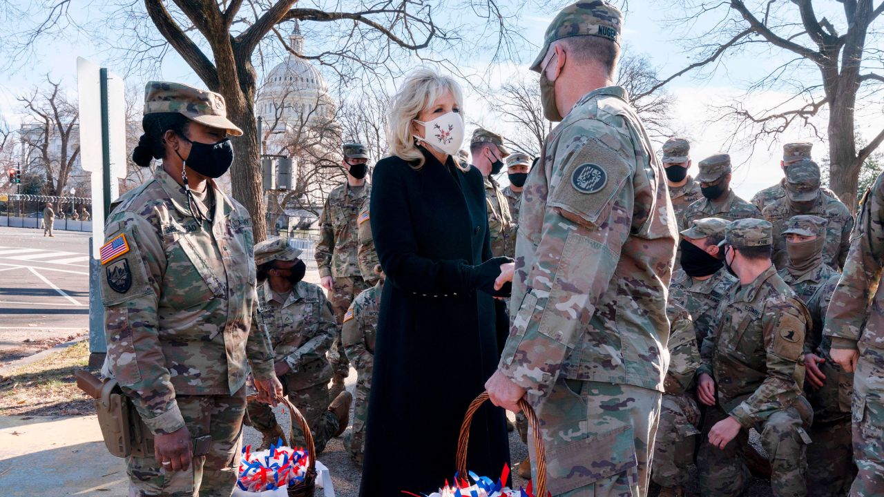 Biden greets members of the National Guard with chocolate chip cookies outside the US Capitol in January.