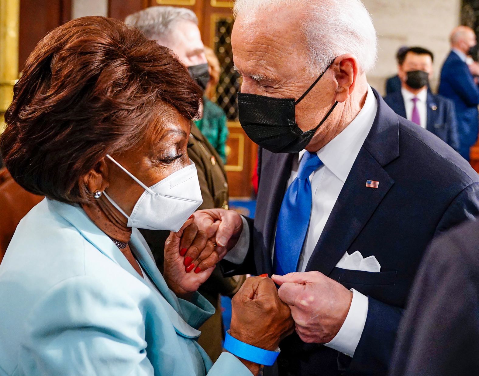 Biden fist-bumps US Rep. Maxine Waters after his speech, which lasted an hour and five minutes.
