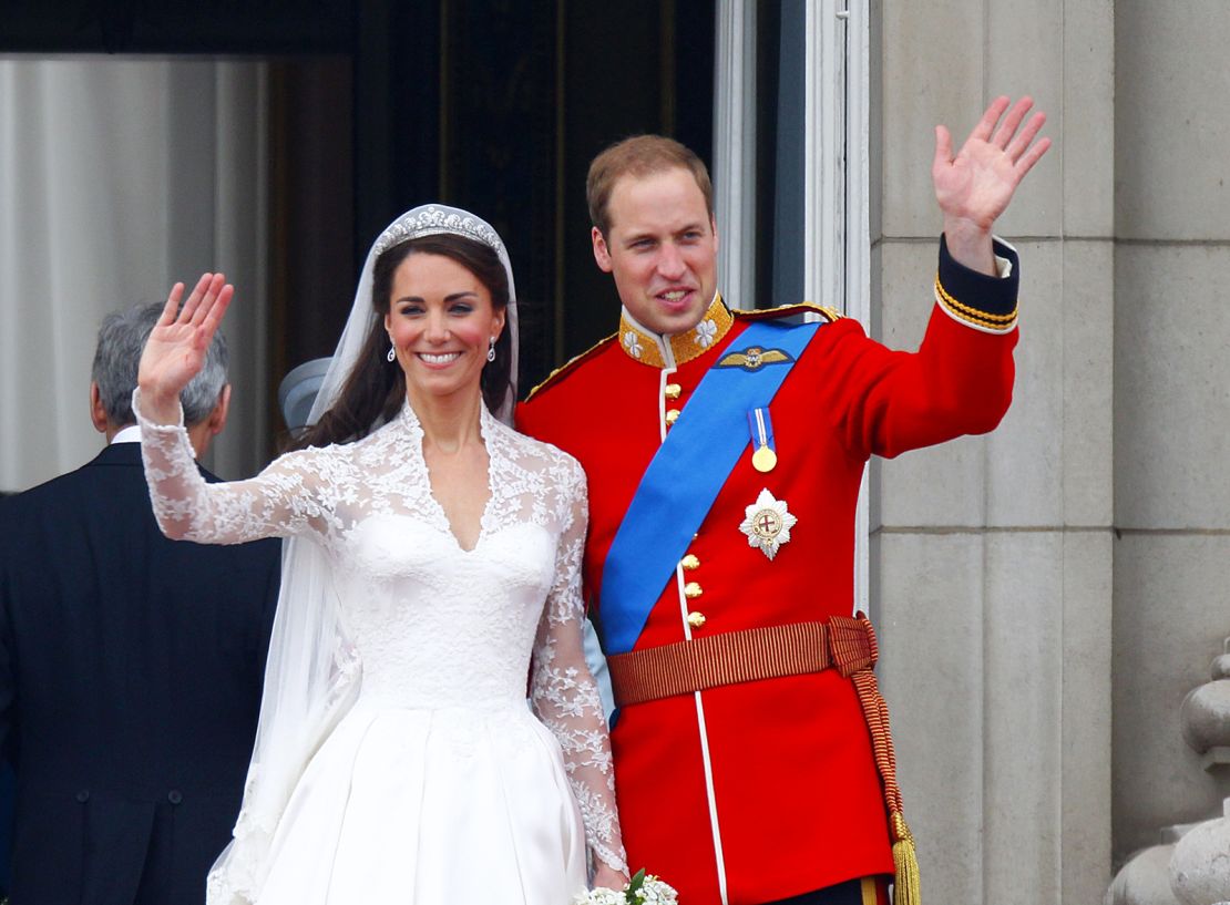 The newlyweds waved to crowds from the balcony of Buckingham Palace, London, on their wedding day.