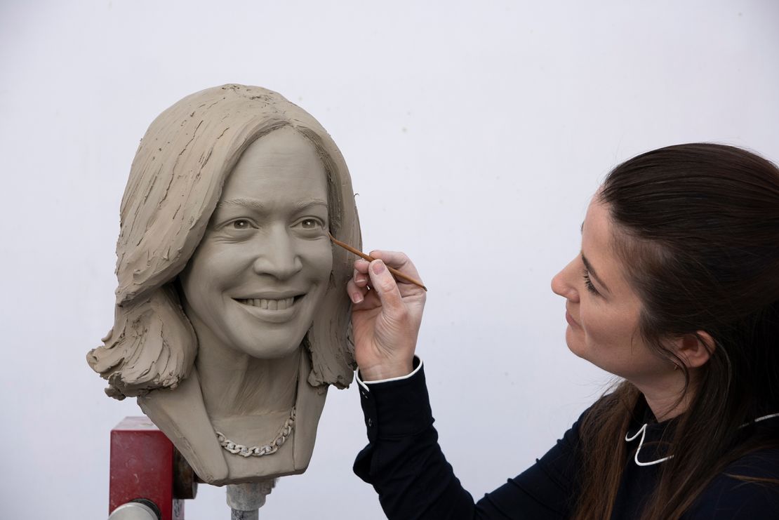 Sculptor Vicky Grant works on the clay bust of Vice President Kamala Harris in London.