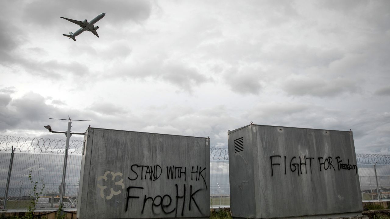 HONG KONG, CHINA - SEPTEMBER 01: Free HK graffiti is seen as a plane takes off from Hong Kong International Airport on September 1, 2019 in Hong Kong, China. Pro-democracy protesters have continued rallies on the streets of Hong Kong against a controversial extradition bill since 9 June as the city plunged into crisis after waves of demonstrations and several violent clashes. Hong Kong's Chief Executive Carrie Lam apologized for introducing the bill and declared it "dead", however protesters have continued to draw large crowds with demands for Lam's resignation and completely withdraw the bill.  (Photo by Chris McGrath/Getty Images)