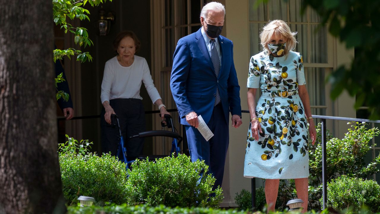 Former first lady Rosalynn Carter looks on as President Joe Biden and first lady Jill Biden leave the home of former President Jimmy Carter during a trip to mark Biden's 100th day in office, Thursday, April 29, 2021, in Plains, Ga. (AP Photo/Evan Vucci)