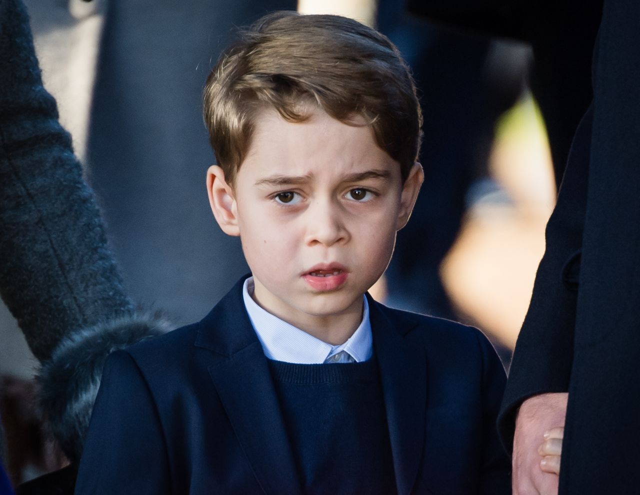 Prince George, the eldest son of Prince William and Catherine, the Duchess of Cambridge, attends a Christmas Day church service in 2019. George is third in line to the British throne, behind his father and his grandfather, Prince Charles.