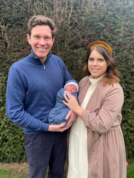 Princess Eugenie and her husband, Jack Brooksbank, hold their newborn son, August, in February 2021. August is 11th in line to the throne, behind his mother, his aunt Princess Beatrice and his grandfather, Prince Andrew.