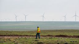 A construction worker walks along a dirt road at the Avangrid Renewables La Joya wind farm in Encino, New Mexico, U.S., on Wednesday, Aug. 5, 2020. The complex will eventually be equipped with 111 turbines and is scheduled to become fully operational by the end of this year. Photographer: Cate Dingley/Bloomberg via Getty Images