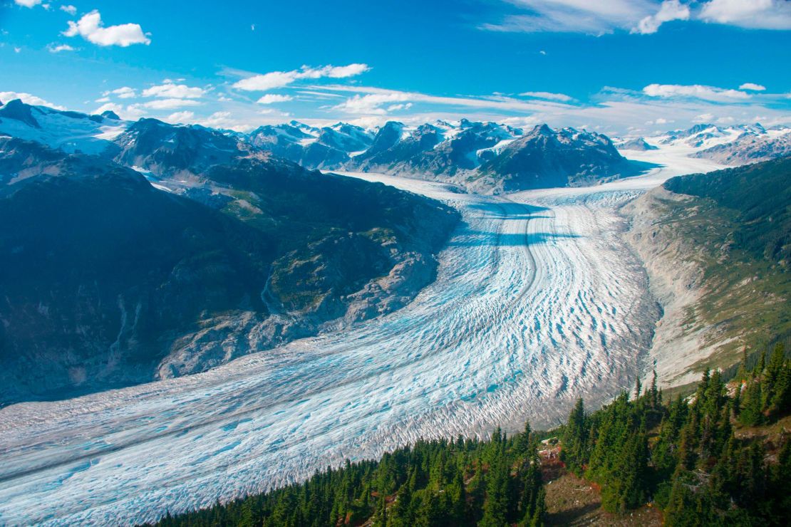 This September 2017 photo provided by researcher Brian Menounos shows the Klinaklini glacier in British Columbia, Canada. The glacier and the adjacent icefield have lost nearly 16 billion tons of snow and ice since 2000. 