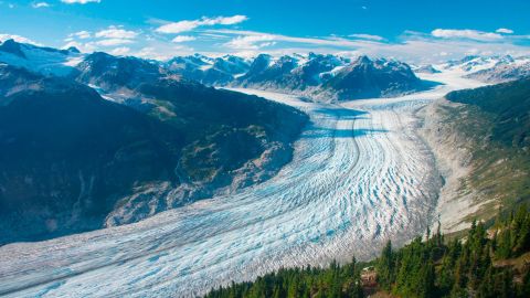 This September 2017 photo provided by researcher Brian Menounos shows the Klinaklini glacier in British Columbia, Canada. The glacier and the adjacent icefield have lost nearly 16 billion tons of snow and ice since 2000. 