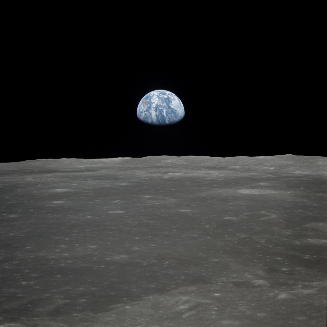 This view of Earth rising over the moon's horizon was taken from the Apollo 11 spacecraft. T