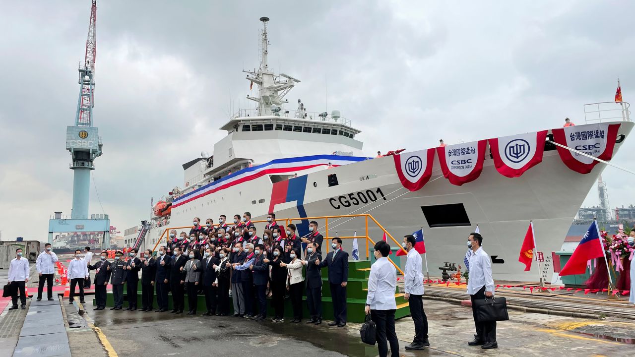 Taiwan President Tsai Ing-Wen and others pose for photos in front of the newly launched coast guard flagship Chiayi in Kaohsiung, Taiwan, on Thursday, April 29, 2021. 