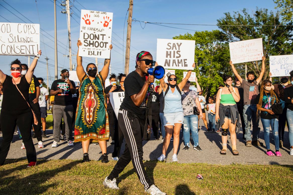 People protest <a href="https://www.cnn.com/2021/04/29/us/andrew-brown-elizabeth-city-shooting-thursday/index.html" target="_blank">the fatal shooting of Andrew Brown Jr.</a> as they march in Elizabeth City, North Carolina, on Tuesday, April 27. Brown, a 42-year-old Black man, was fatally shot by Pasquotank County sheriff's deputies when they attempted to serve him with an arrest warrant, the sheriff's office said. Protesters and family members have called for the release of body camera footage to determine what led to the shooting.