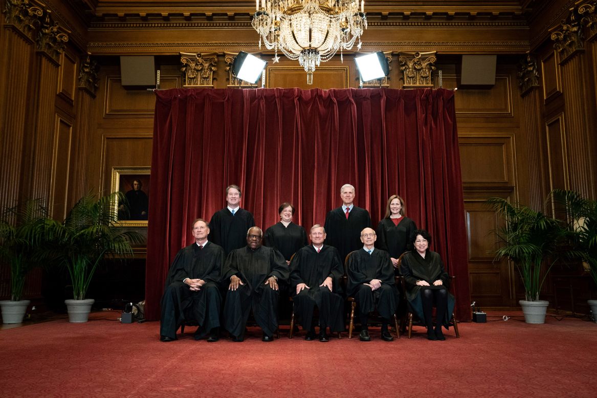 Members of the US Supreme Court <a href="https://www.cnn.com/2021/04/23/politics/amy-coney-barrett-supreme-court-picture/index.html" target="_blank">pose for a group photo</a> in Washington, DC, on Friday, April 23. Seated from left are Samuel Alito, Clarence Thomas, Chief Justice John Roberts, Stephen Breyer and Sonia Sotomayor. Standing behind them, from left, are Brett Kavanaugh, Elena Kagan, Neil Gorsuch and newest Justice Amy Coney Barrett. 