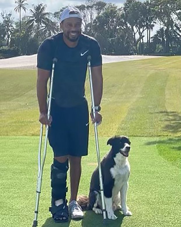Tiger Woods poses with his dog in this photo <a href="https://www.instagram.com/p/COBhSUNj95S/" target="_blank" target="_blank">he posted to Instagram</a> on Friday, April 23. It is the first photo he's posted of himself since suffering serious leg injuries in a car accident in February. "My course is coming along faster than I am," Woods wrote. "But it's nice to have a faithful rehab partner, man's best friend."
