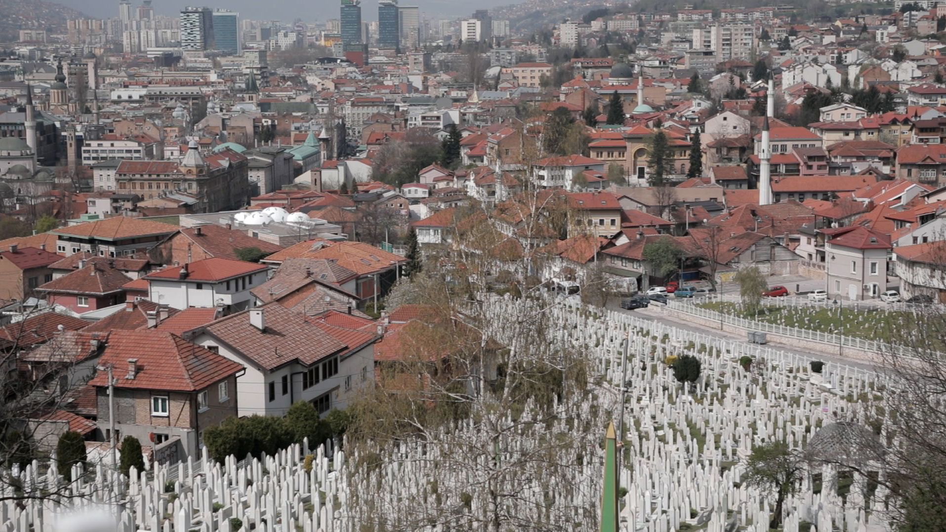 In the hills of Sarajevo, Bosnia and Herzegovina's war dead are marked in row after row of uniform white graves.