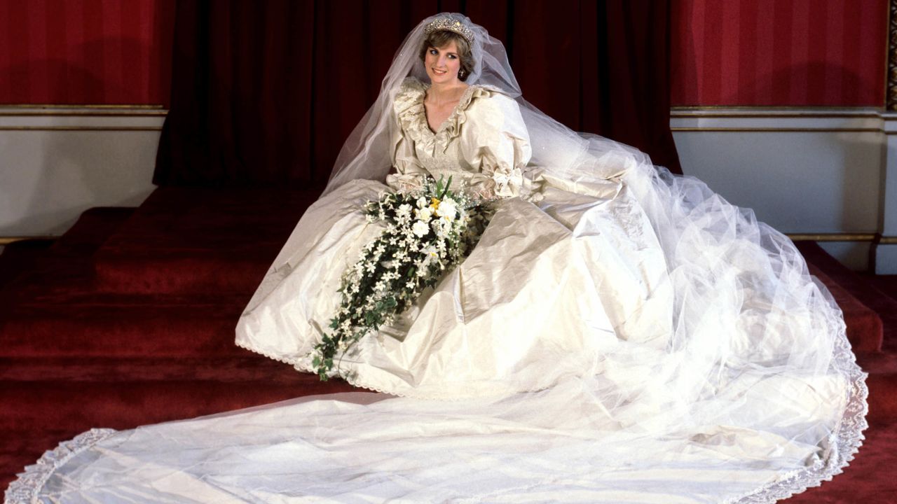 File photo dated 29/07/81 of the Princess of Wales seated in her bridal gown at Buckingham Palace after her marriage to Prince Charles at St. Paul's Cathedral.