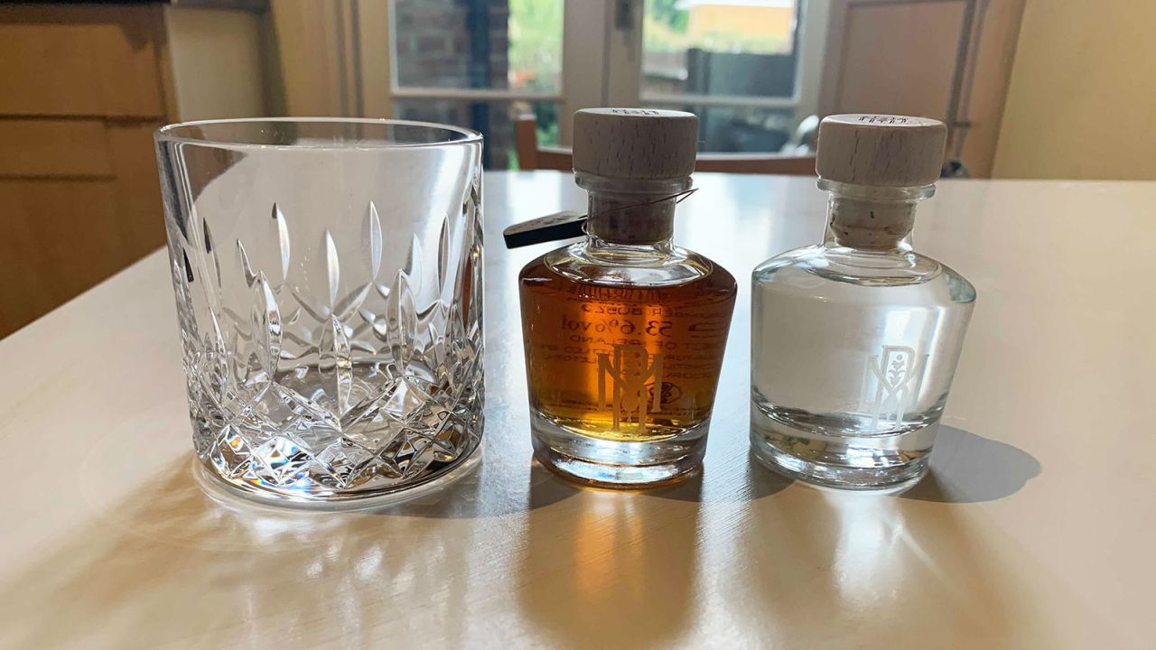 Sampling the whiskey at home with a Waterford Crystal glass. 
