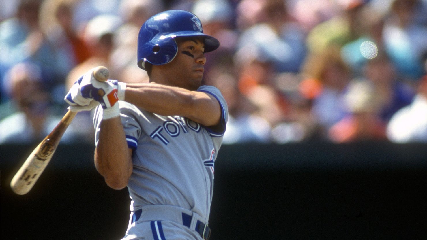 Roberto Alomar #12 of the Toronto Blue Jays bats against the Baltimore Orioles during an MLB game circa 1995 at Oriole Park at Camden Yards in Baltimore, Maryland.