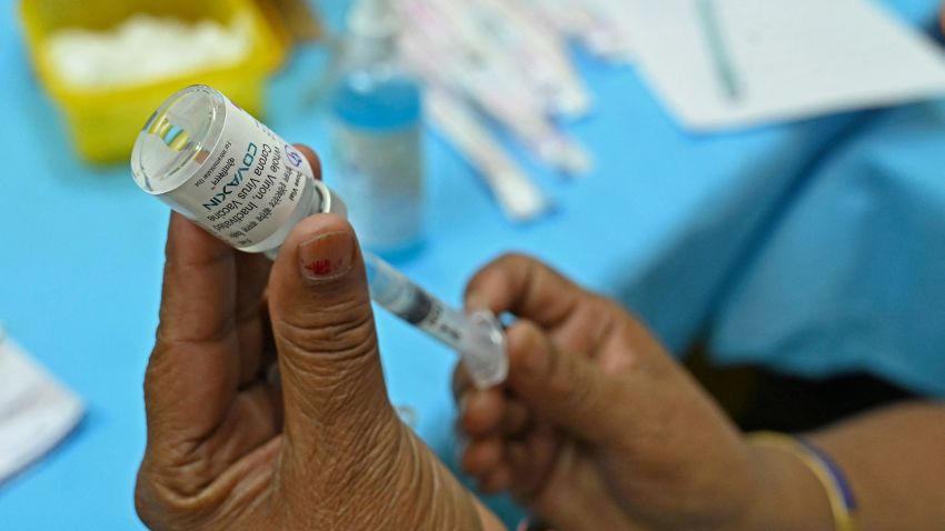 A medical worker prepares a jab of the Covaxin Covid-19 coronavirus vaccine, at a health centre in New Delhi on April 29, 2021.
