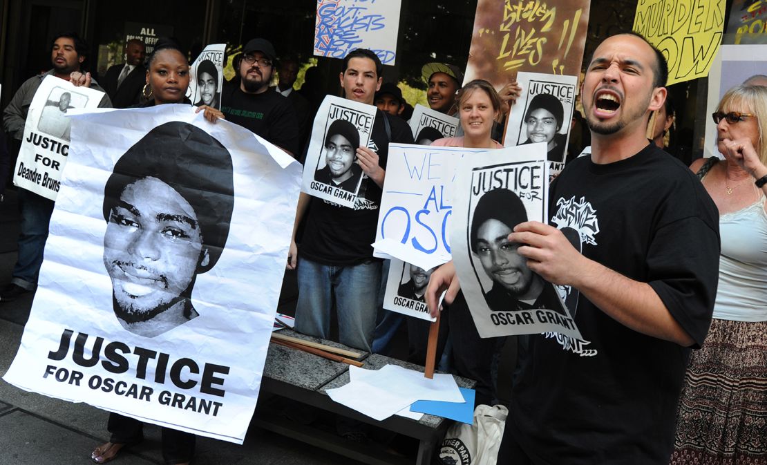 Aidge Patterson of the LA Coalition for Justice for Oscar Grant leads a protest rally in 2010. (MARK RALSTON/AFP via Getty Images)