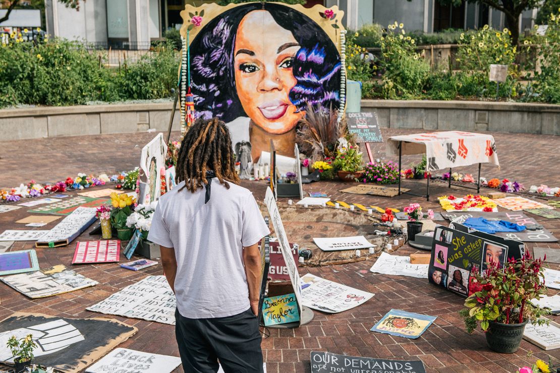 A man looks over a memorial dedicated to Breonna Taylor in Louisville, Kentucky. (Photo by Brandon Bell/Getty Images)