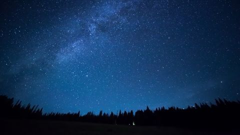 Theoretical physicist Chanda Prescod-Weinstein, who explores the structural oppression of the scientific community as one of the themes in her new book, advocates for making the "night sky accessible" to all children. A starry night at Yellowstone National Park is shown here. 