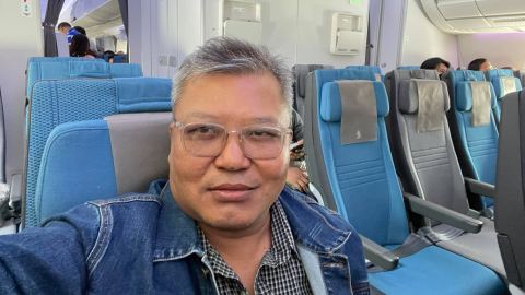 Toe Zaw Latt on a plane leaving Myanmar in April, 2021. 