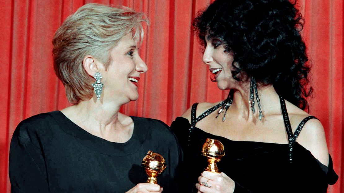 Olympia Dukakis and Cher hold the Golden Globes they won in January 1988 for their performances in "Moonstruck." Both would go on to win Academy Awards later that year.