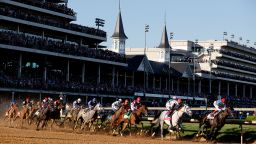 LOUISVILLE, KENTUCKY - MAY 01: Medina Spirit #8, ridden by jockey John Velazquez, leads the field around the first during the 147th running of the Kentucky Derby at Churchill Downs on May 01, 2021 in Louisville, Kentucky. (Photo by Sarah Stier/Getty Images)